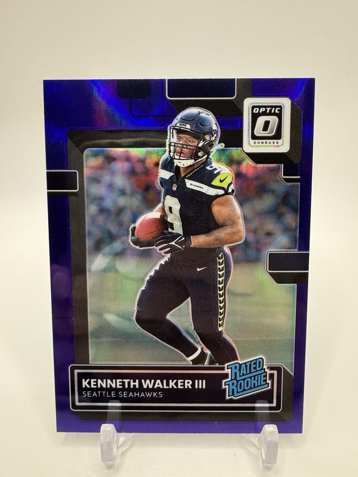 2022 Panini Optic - Rated Rookie Kenneth Walker III #218 Purple Prizm /50 (RC)