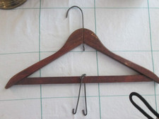 Vintage wooden hanger for a coat and hooks for pants