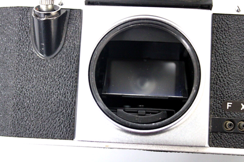Porst Weitwinkel FX4 Spiegelreflexkamera Objektiv 1:3.5/35 mm - Bild 9 von 15
