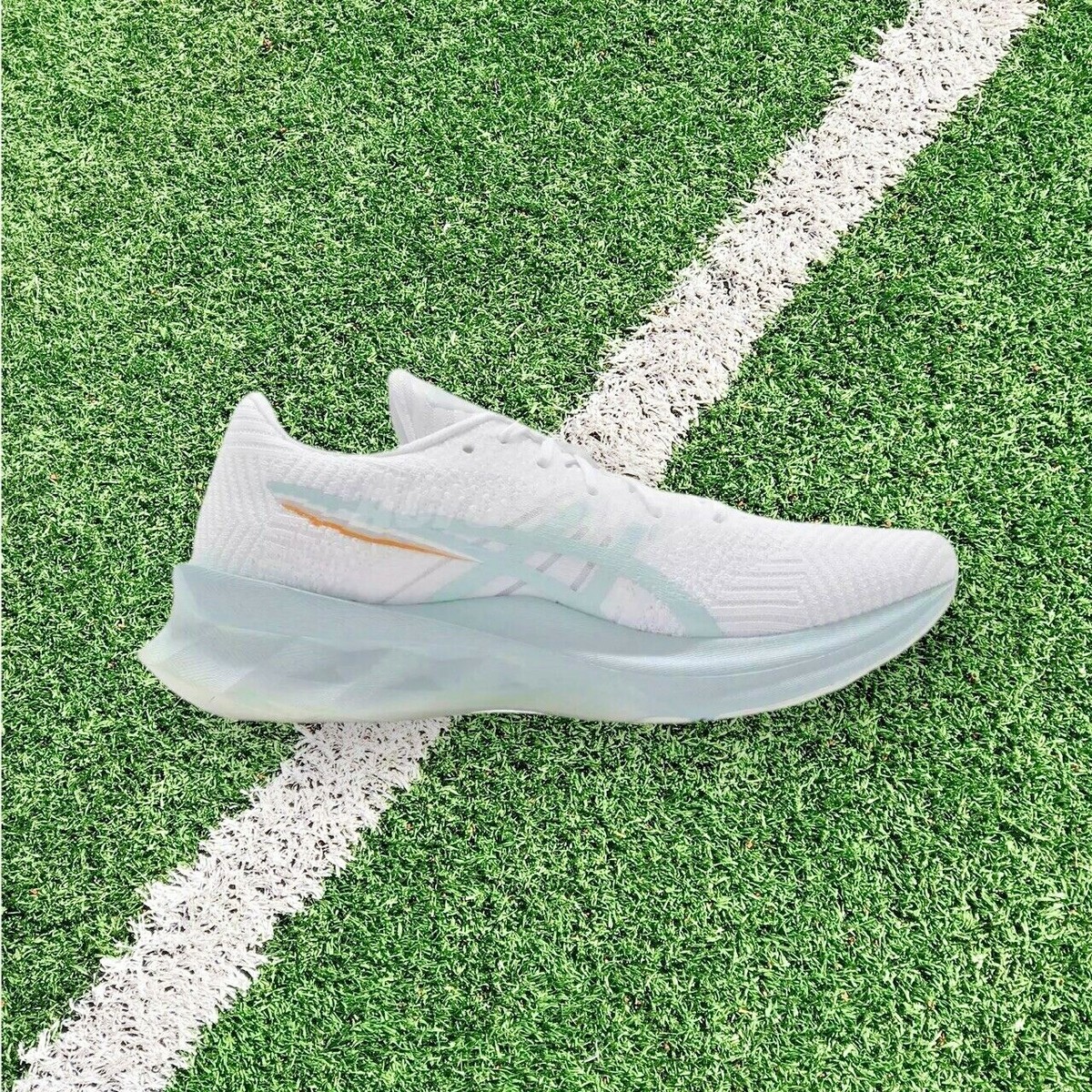 Asics Novablast 'Pixel Noise White Aqua Angel 1012B006-100