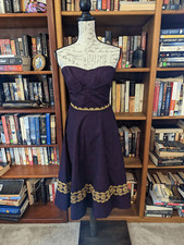 girls from the savoy anthropologie aubergine sky strapless purple and gold dress