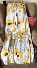 Lovely lined curtains with yellow flowers from Dunelm measuring 117cm x  137cm