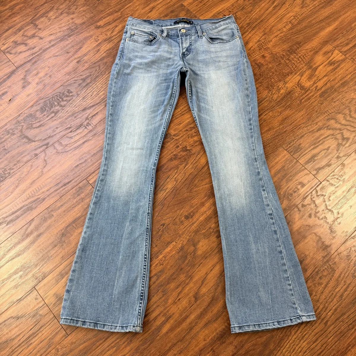 Jeans Levi's Low Boot Cut – Taille 7 – Denim Bleu Foncé – Légèrement Extensible – Occasion