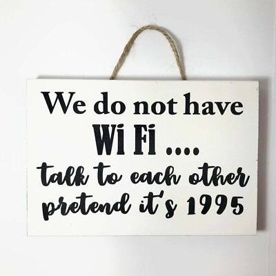 We do not have Wi Fi  sign Talk to each other pretend it's 1995 handmade wood