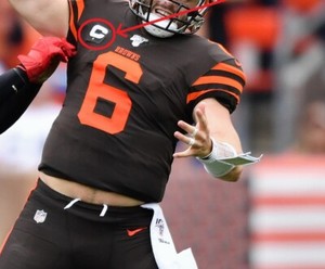 c patch on football jersey