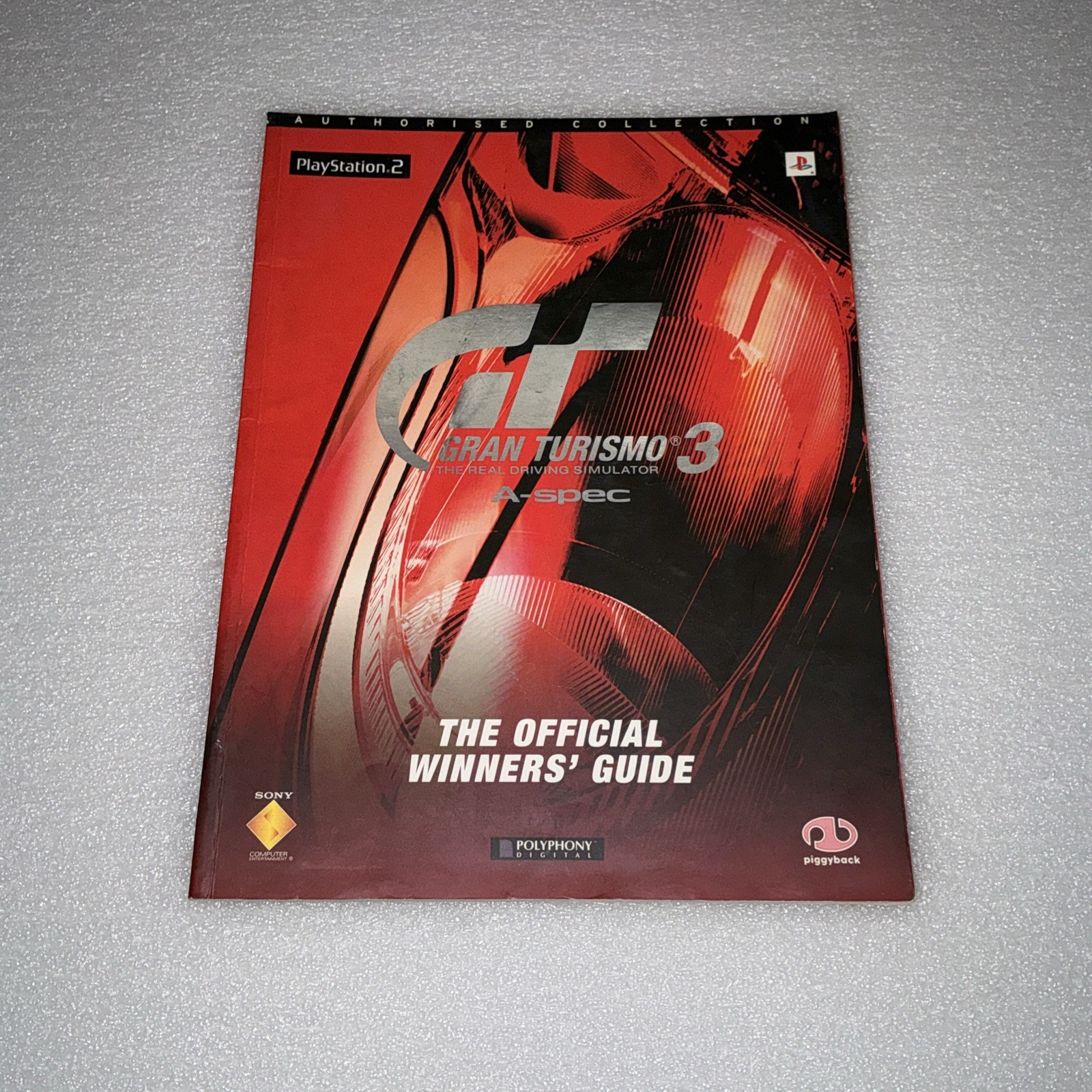 Gran Turismo 3 A-spec The Official Winners strategy guide Piggyback Paperback gc