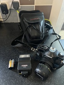Cosina C1 SLR Film Camera With 35-70 Lens, Case and Cobra CX150’Flash