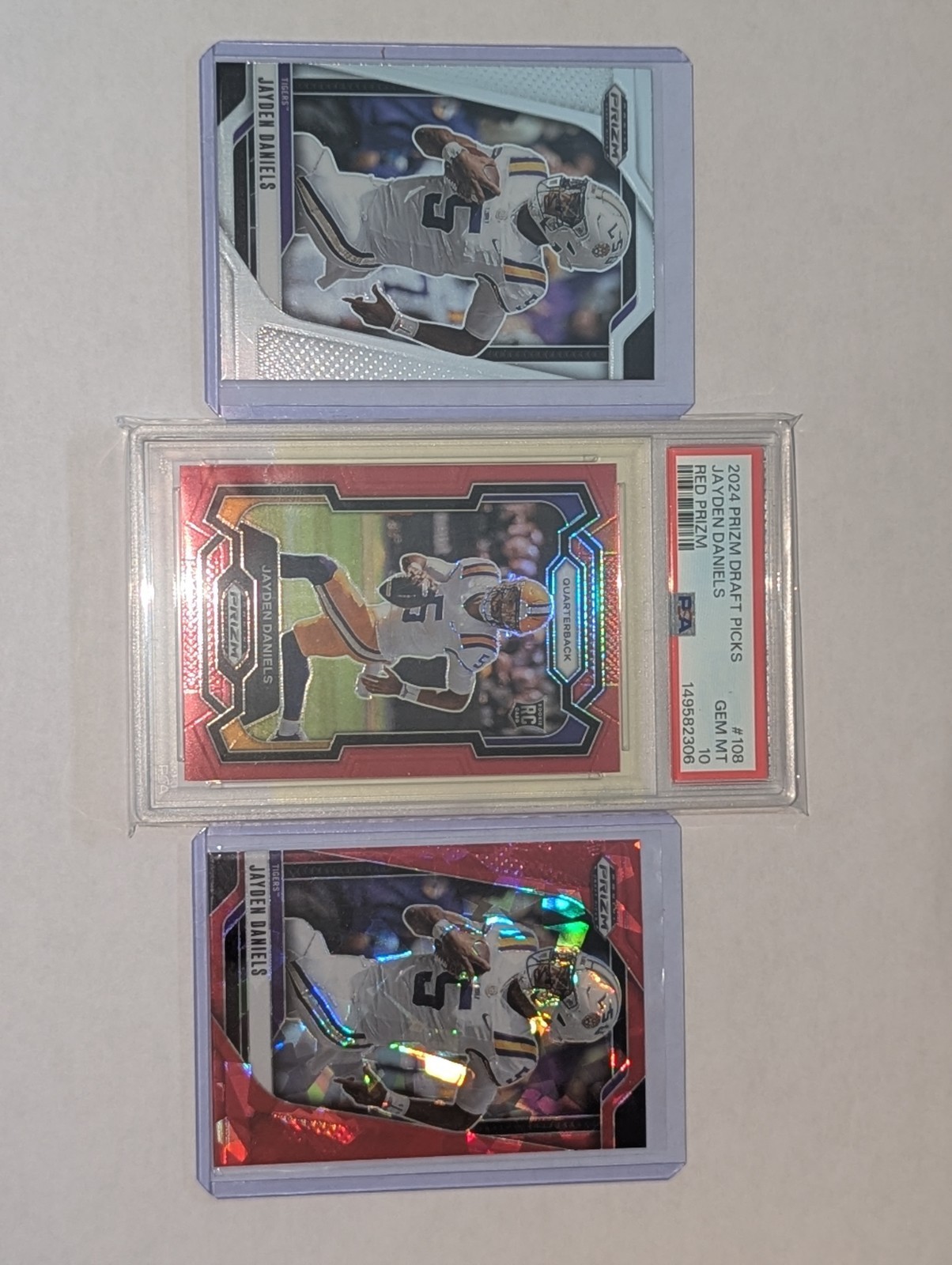 Jayden Daniels 2024 Prizm Draft Picks Red Prizm  /299 PSA 10 And 2 2025 Lsu Jd5