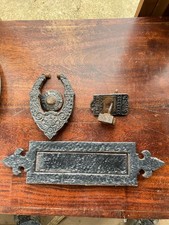 Vintage iron black letterbox and door knocker, gothic style