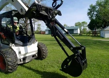 Bradco Swing Backhoe attachment for skid steers with bucket & thumb, digs 6 ft