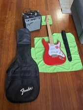 Squier Stratocaster Electric Guitar Pack with Fender and Frontman 10g Amp.