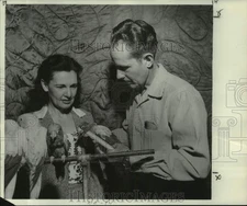 1957 Press Photo Jersome Wilson measures Bird with Secretary Miss Lillian Gross