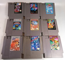 LOT OF 9 NES NINTENDO GAMES - Rollerball, Vegas, Track Meet, Winter Games, more