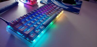 60% Mechanical keyboard with hand lubed Akko matcha green switches, ANSI layout.