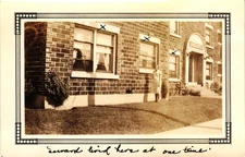 Vintage 1930s Seward Brick Apartment Building Woman Standing Outside
