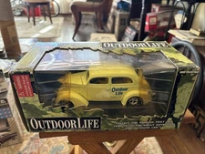 NIB Diecast Car Racing Champions 10 Years OUTDOOR LIFE ISSUE #2  Yllw COUPE 1:24