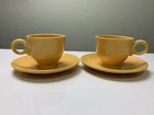 Pair Of Vintage Fiesta Yellow Cups & Saucers With Ring Handle - Read-