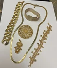 A nice Vintage lot of 6 Gold Tone costume jewelry pieces