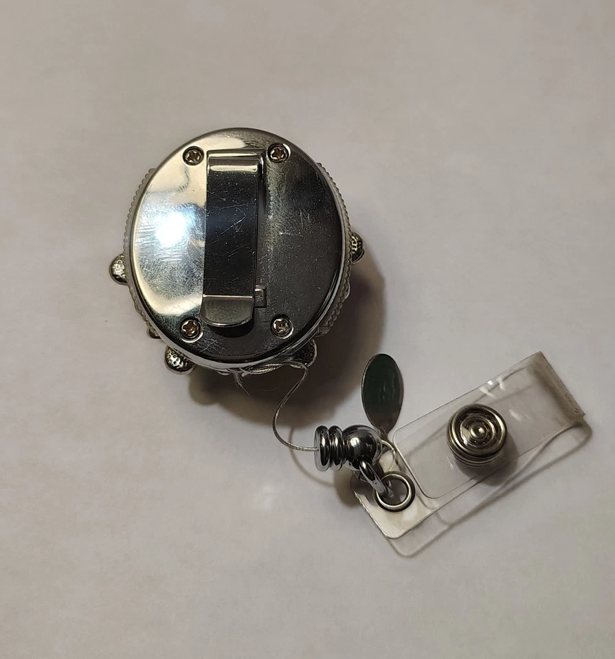 Soporte de insignia retráctil de flores coloridas - Etiqueta de cordón de carrete de metal de alta resistencia Foto 2 de 4