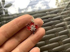 STERLING SILVER ICE HOCKEY PLAYER ON RED ENAMEL CANADIAN MAPLE LEAF PENDANT