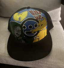 Hand-painted custom snapback hat featuring se...