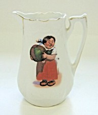 Antique German porcelain Pitcher girl playing ball
