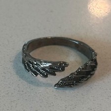 silver feather ring with textured, layered design adjustable unisex