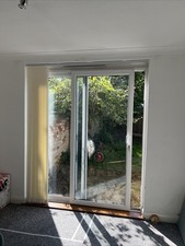 UPVC sliding patio door 2300mm Hight 1900mm wide. Left to right opening