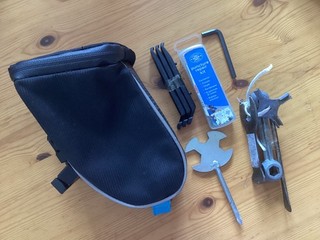 Cycle bag detachable under seat with extras. Good condition 18x11x10cm approx