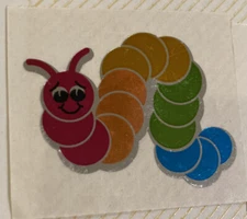 Vintage 1980’s foil shiny rainbow caterpillar sticker by Hambly