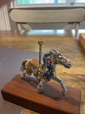 Vintage hand made and painted carousel horse on brass pole, wood base.