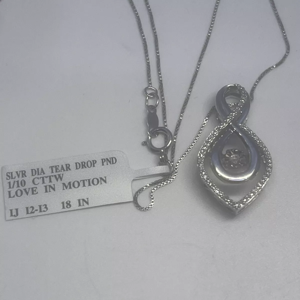 Love in hotsell motion necklace
