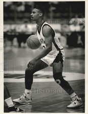 Press Photo Basketball Player Dribbles Down Court During Game - srs03716