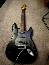 Signed Squier Stratocaster Black Solid Body 6-String right handed