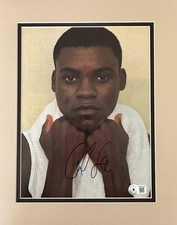 Carl Lewis Signed 81/2x11 Magazine Photo Beckett Authenticated