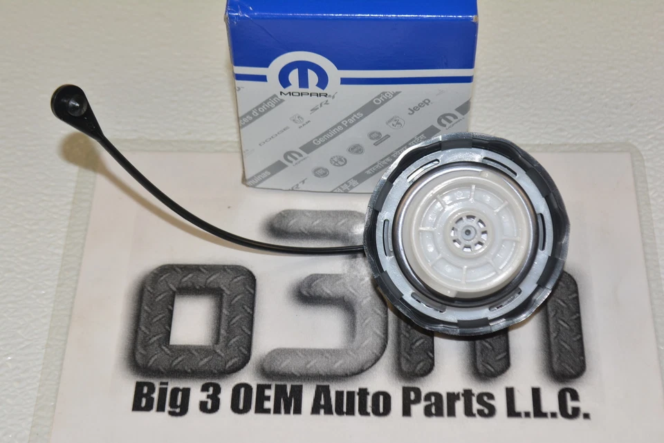 Jeep Chrysler Dodge Plymouth Tapa de gasolina de llenado de combustible sin bloqueo con amarre nuevo OEM Foto 2 de 3