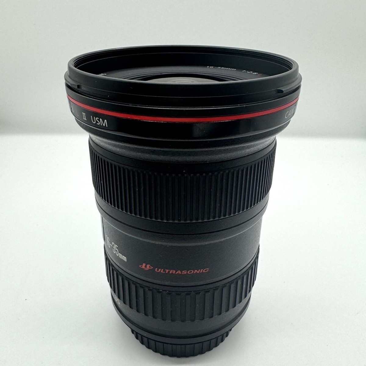 Canon Lens EF 16-35mm f/2.8L II USM with filter hood good Canon Lens EF 16-35mm f/2.8L II USM with filter hood good