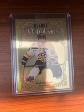 2023-24 UPPER DECK ALLURE #DB-59 BRAD MARCHAND DOUBLOONS SSP Insert
