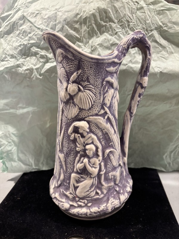 Handmade Ceramic Pitcher with handle.