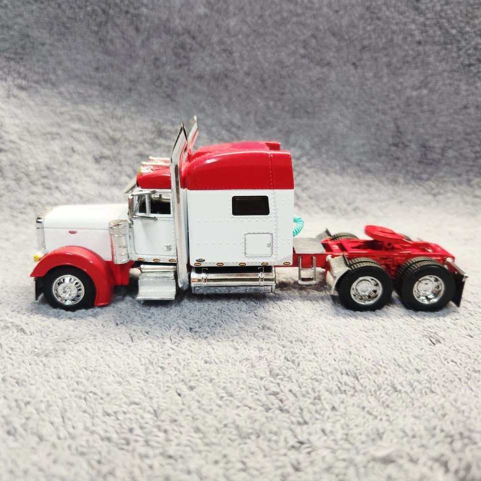 DCP DC WhtRed Peterbilt 379 Mid Roof Sleeper W/ Transcraft Step Deck Trailer. - Image 2 of 4