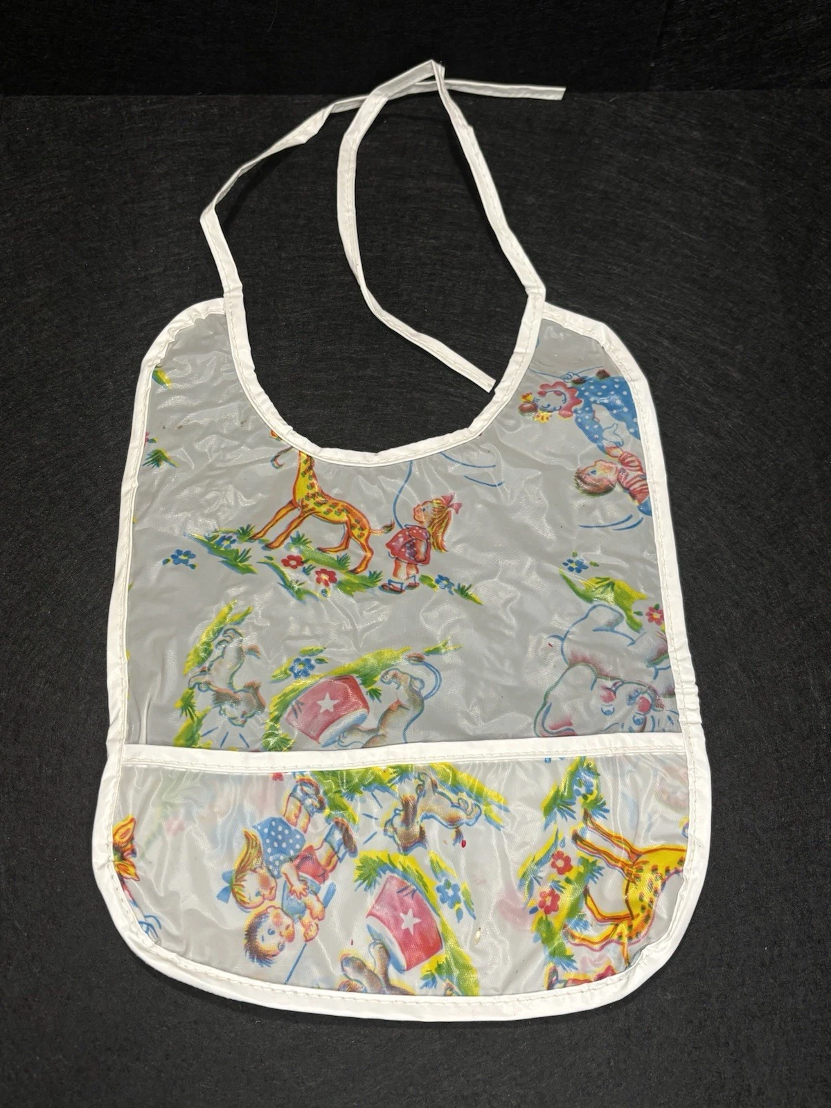 VTG Toddler Plastic Tie On Vinyl Bib W/Crumb Catcher Pocket Multicolor Circus
Opens in a new window