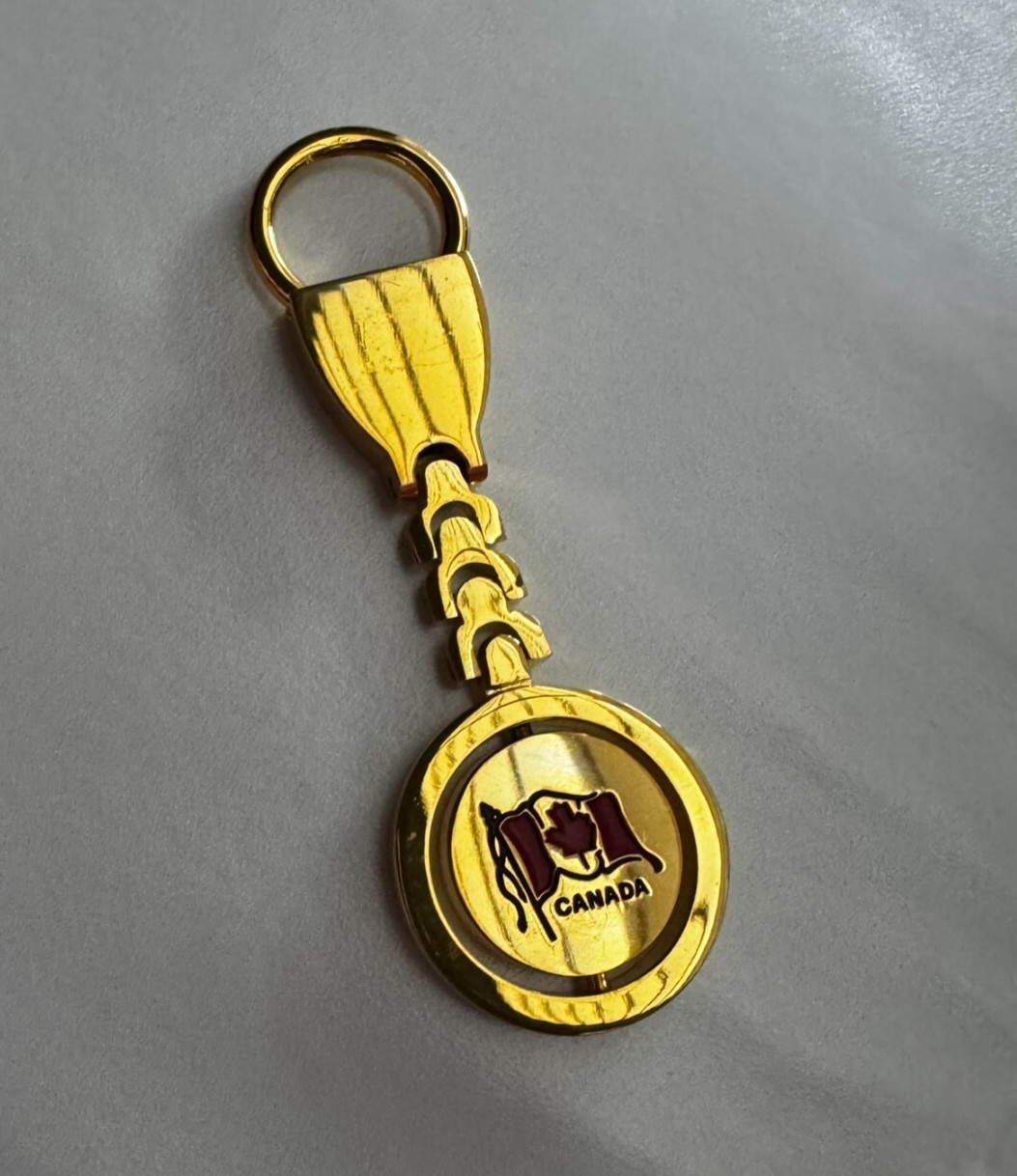 Canada Gold Tone Keychain Key Ring Spinning Flag Souvenir