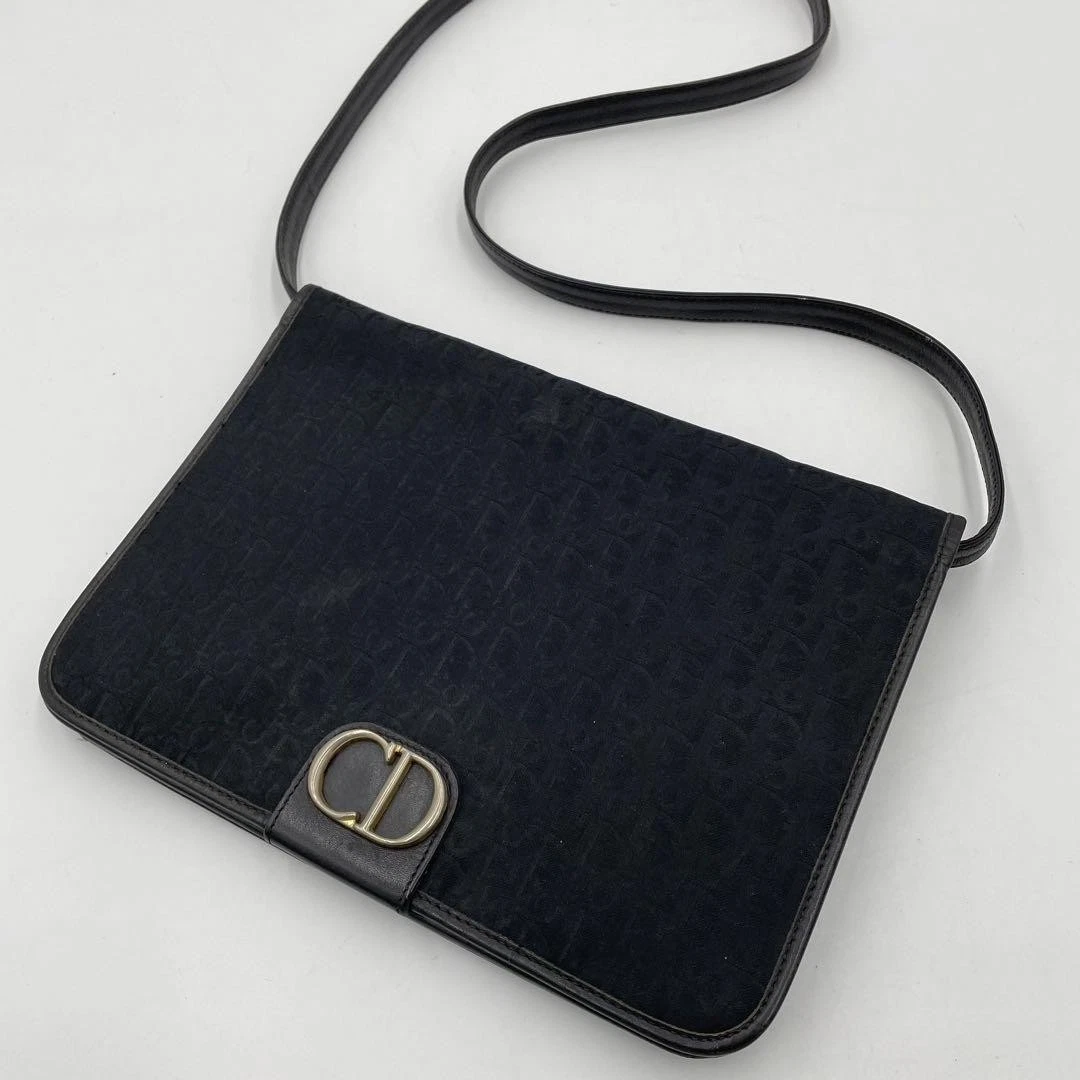 Beau sac bandoulière Christian Dior motif trotteur support CD noir