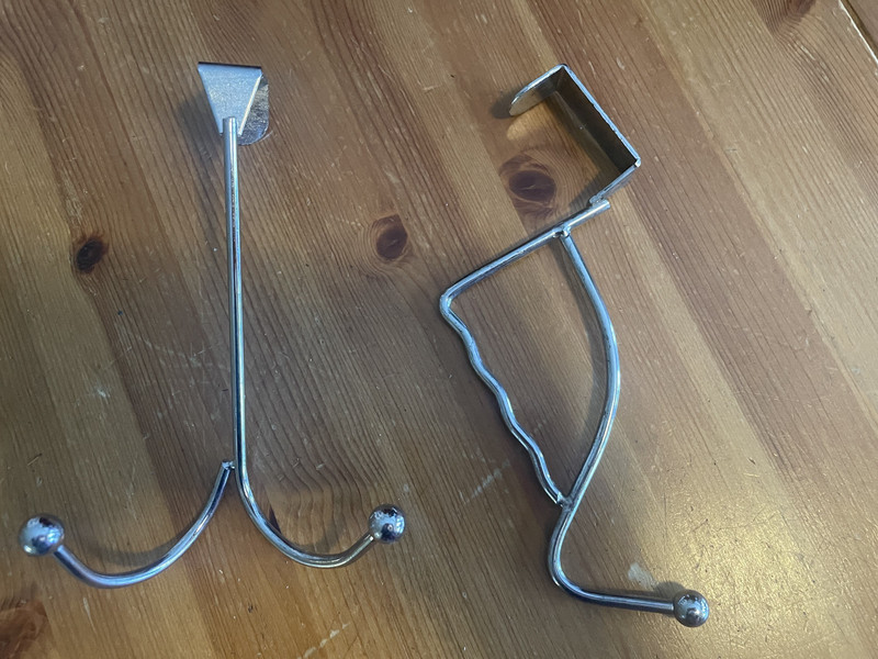 2 steel door hanging hooks