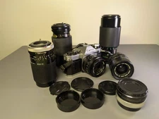 A+ Canon AE-1 Program 35mm Film Camera w/ lot of 5 lenses and other accessories