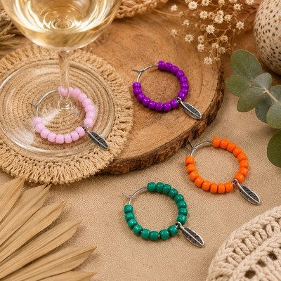 One Of A Kind Set Of 4 Handmade Multicolor Seed Bead And Silver Feather Charms.