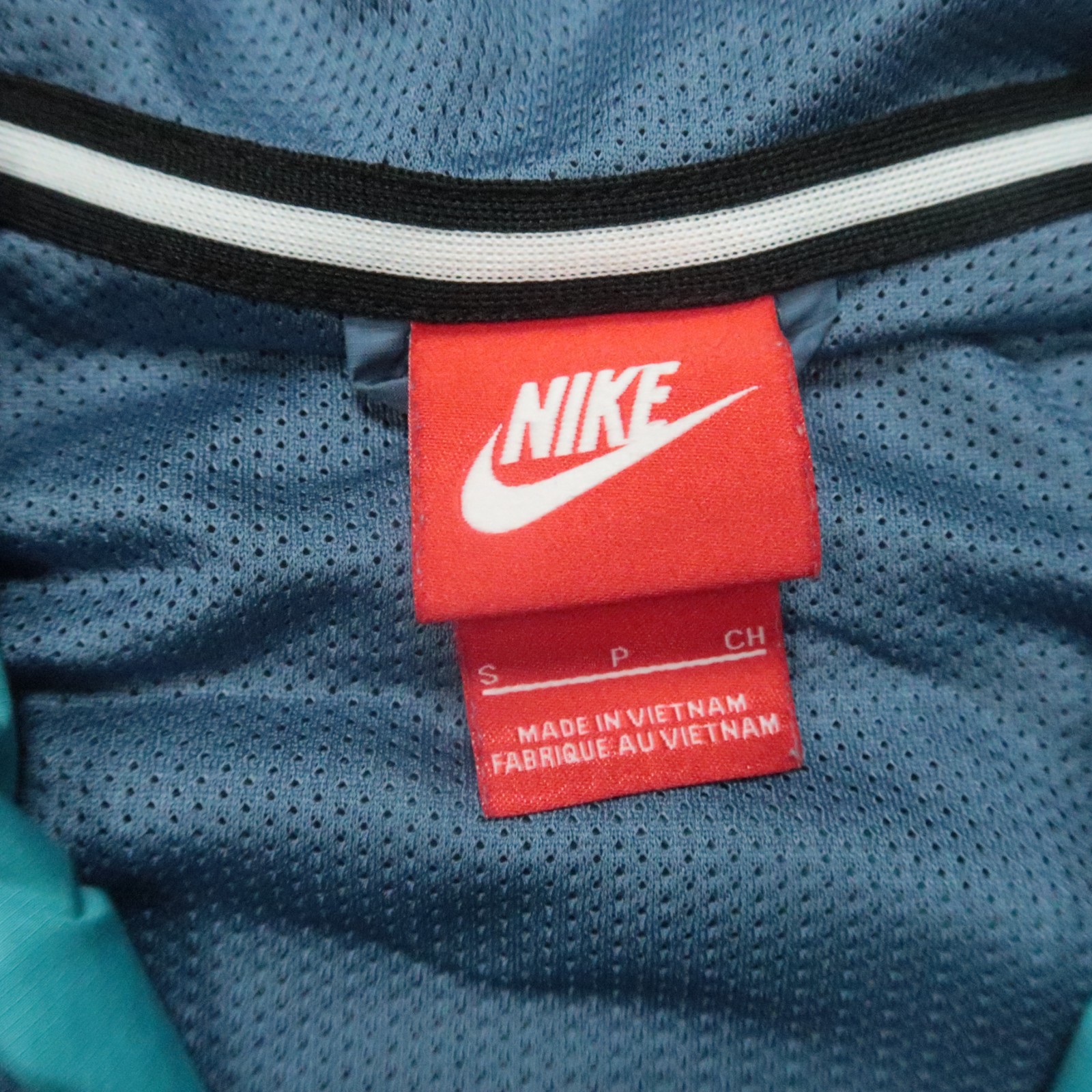 SACAI X NIKE Giacca a vento Nike uomo piccola blu windrunner con cappuccio zip intera colorblock