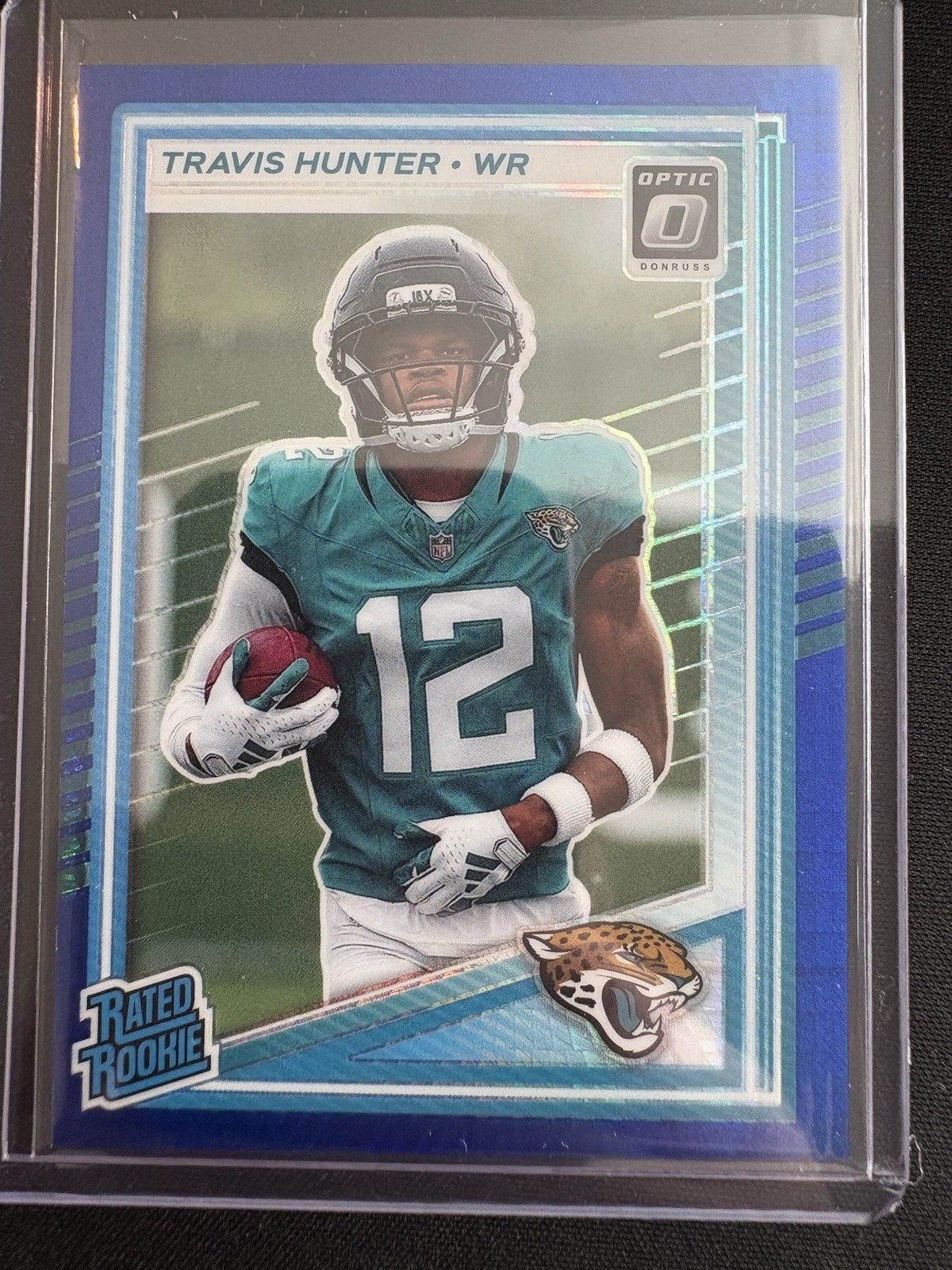 2025 Panini Donruss Optic - Rated Rookie Travis Hunter #201 Blue Hyper Prizm