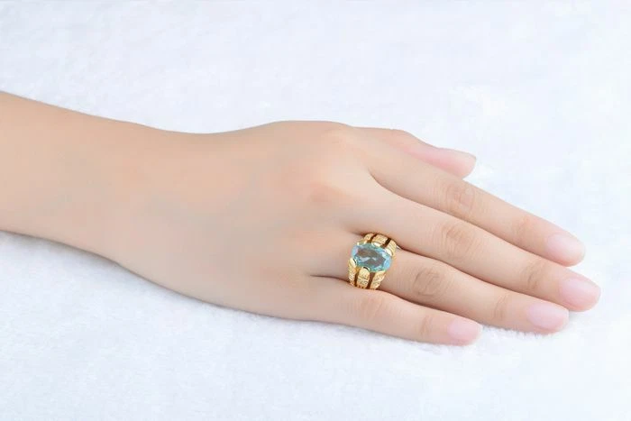 Anillos de banda de aniversario enchapados en oro aguamarina con halo para hombre talla 8-12 Foto 2 de 4