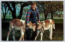 A Boy Posing With His Calves Vintage Postcard